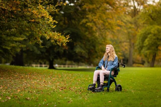 Woman on a wheelchair in the park